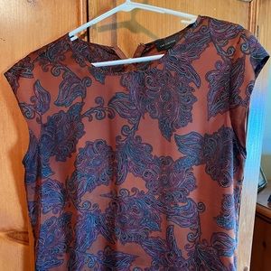 Cap sleeve rust rayon shell.
